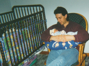 Rob with our son when he was a few days old 